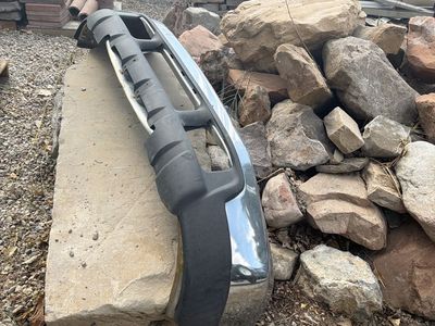 Used Chrome Front Bumper Assembly with Black Trim Plastic Upper Valanced