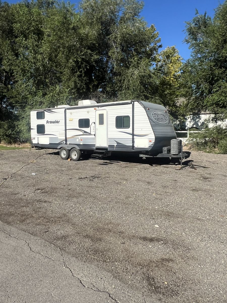 Heartland Prowler Travel Trailer RV with Slide-Out