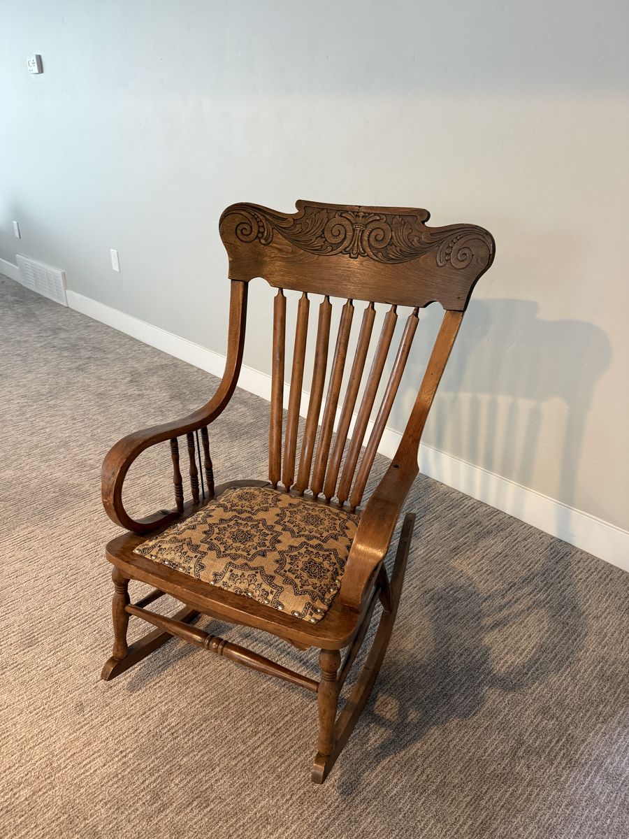 Antique rocking chair.  See pics for details.