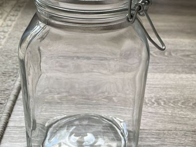 This is a Bormioli Rocco Fido Glass Jar featuring a clear glass swing-top lid with a wire bail clamp