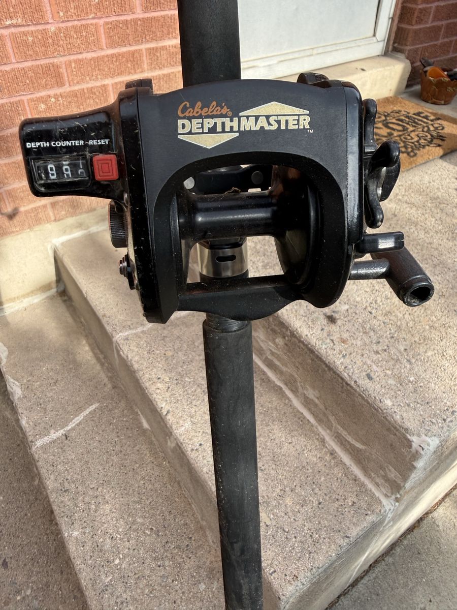 Shimano Fishing pole and Cabela’s Depth Master Trolling Reel