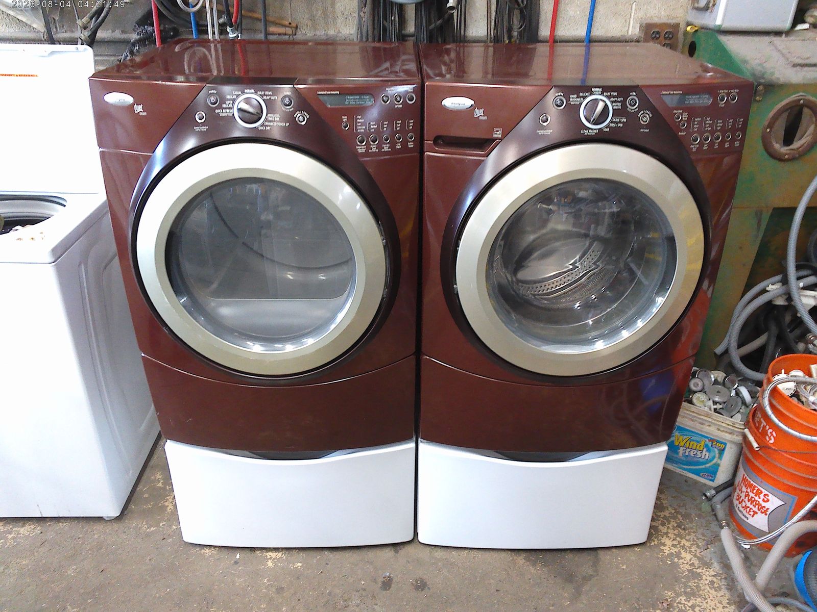 Whirlpool Duet front load washer with matched electric dryer on pedestals