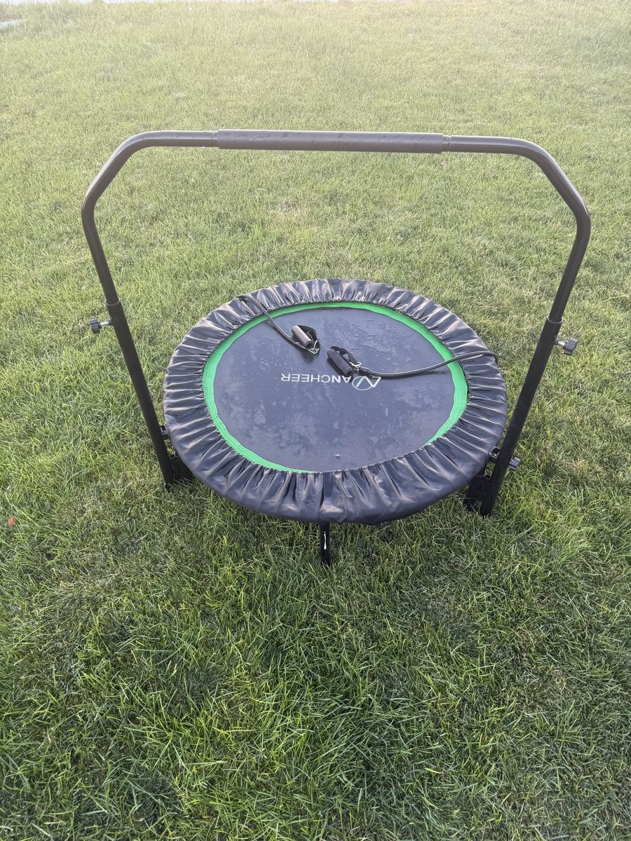 Trampoline with Adjustable Handle Bar and Resistance Bands