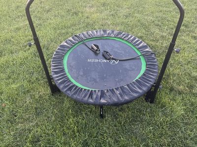 Trampoline with Adjustable Handle Bar and Resistance Bands