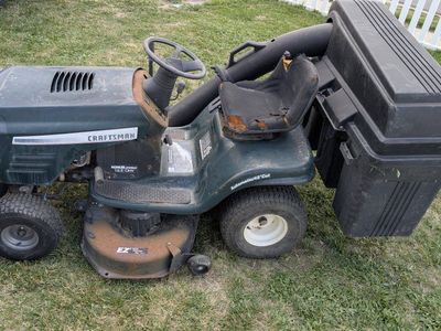 Craftsman Riding Mower with grass catcher and plow