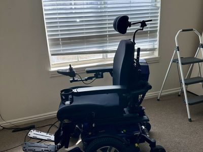 Quantum J6 Power Chair Electric Wheelchair with Footrests, Headrest, and Controller