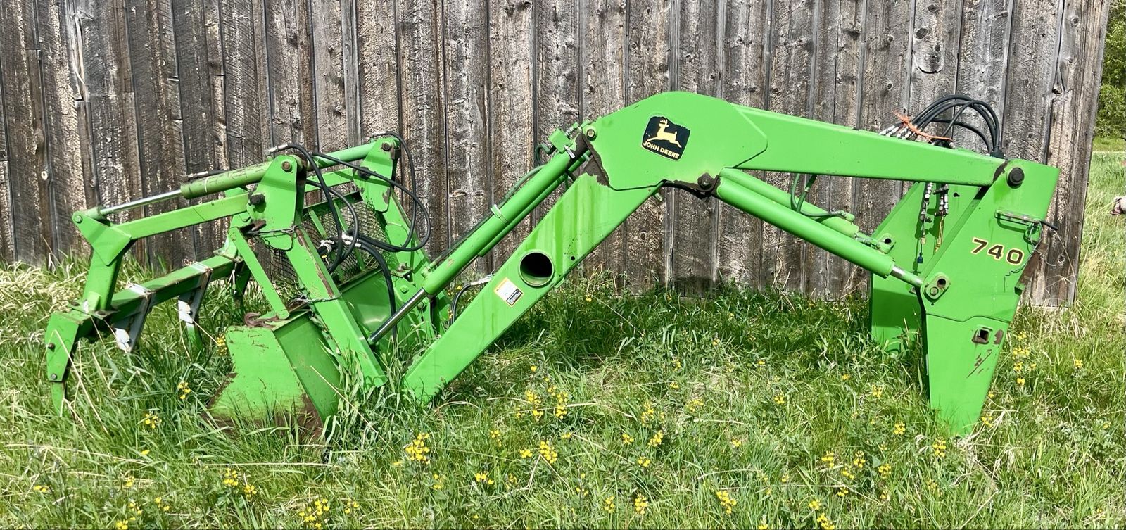 740 loader with grapple