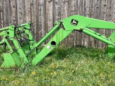 740 loader with grapple