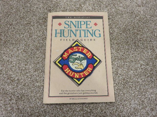 1991 FIRST ADDITION OF THE VERY HUMOROUS "OFFICAL GUIDE TO SNIPE HUNTING FIELD GUIDE" PARODY BOOK!