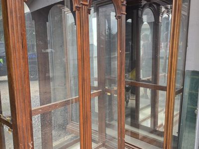 Vintage Wooden Curio Cabinet with Glass Panels and Arched Trim