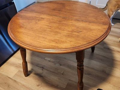 Wooden table with leaf