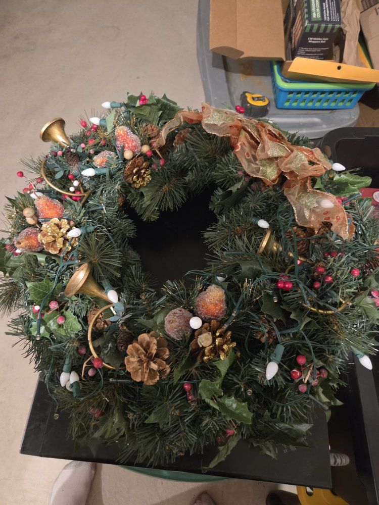 Pre-Lit Christmas Wreath with Pinecones, Red Berries, Gold Horns, and Ribbon Accent
