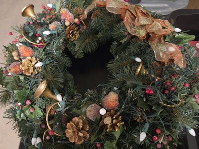 Pre-Lit Christmas Wreath with Pinecones, Red Berries, Gold Horns, and Ribbon Accent