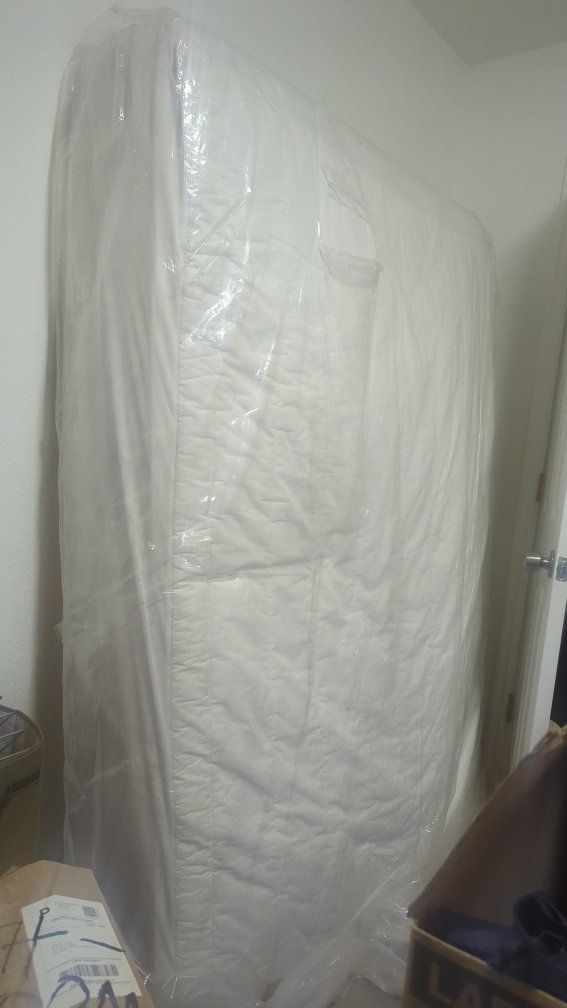 White Mattress in Plastic Wrap full size. evermore brand made by salt lake mattress company