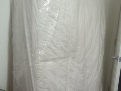 White Mattress in Plastic Wrap full size. evermore brand made by salt lake mattress company