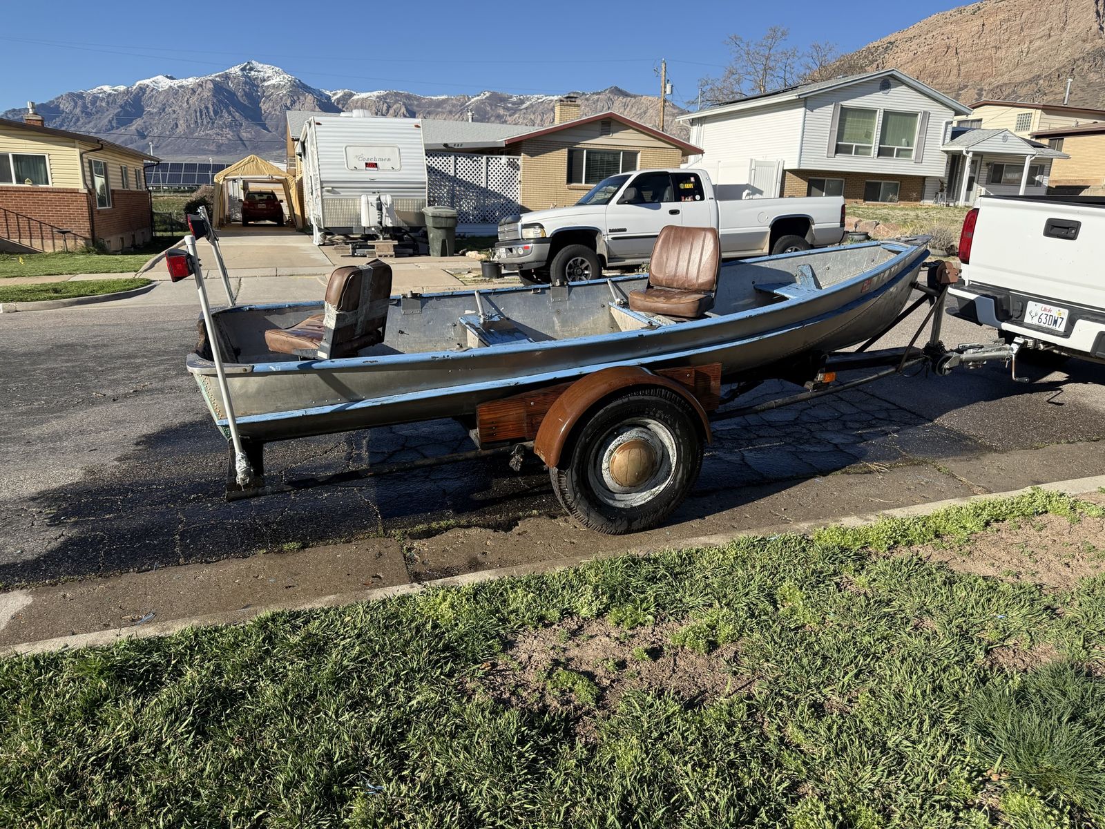 Small fishing boat w/motor and trailer