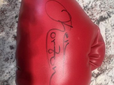 Ken Norton boxing gloved signed