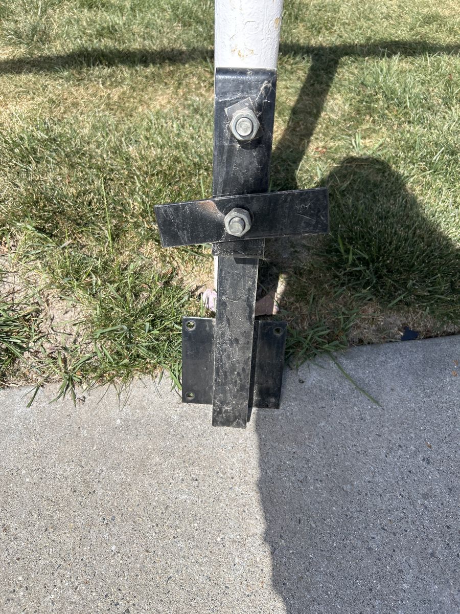 Bolt on spare tire carrier