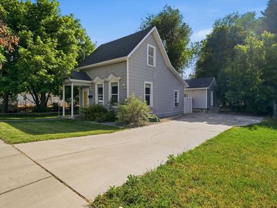 This charming 2-story Logan home is packed with character and all the big-ticket updates buyers love.
