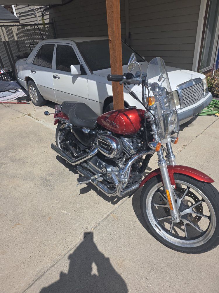 2014 Harley-Davidson Sportster 1200 superlow Motorcycle in Red with Windshield