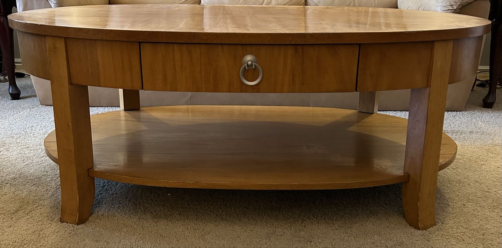 Oval Wooden Coffee Table with Storage Drawer and Lower Shelf