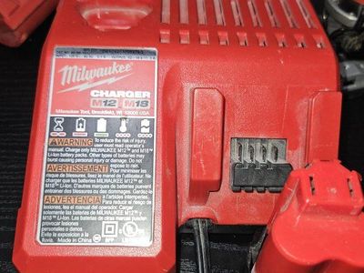 Milwaukee M12/M18 Cordless Tools Combo Kit - Jigsaw, Cut off tool, Charger, Battery