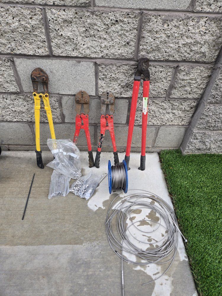 Assorted Heavy-Duty Bolt Cutters, Crimpers, Stainless Cable Spool, Wire, and Hardware 