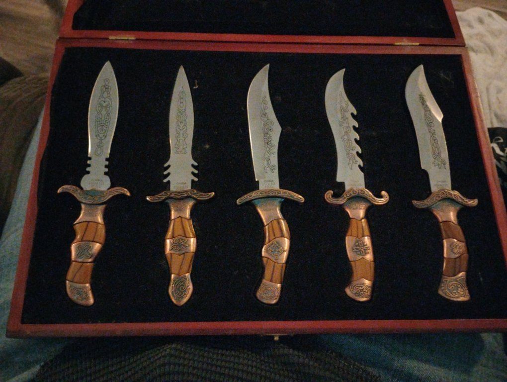Decorative 5-Piece Fantasy Dagger Set with Engraved Blades and Display Case