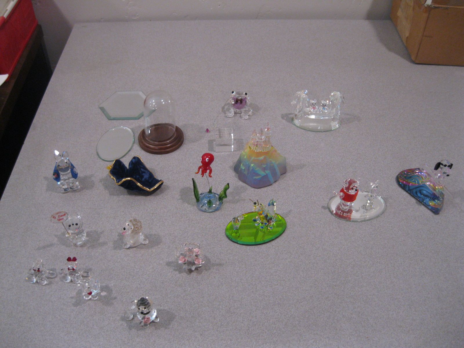 Collection Of Crystal Figurines With Snoopy and Winnie The Pooh