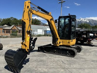 Mini Excavator for Rent – Cat 304 / 4 Ton Excavator with Blade and Thumb