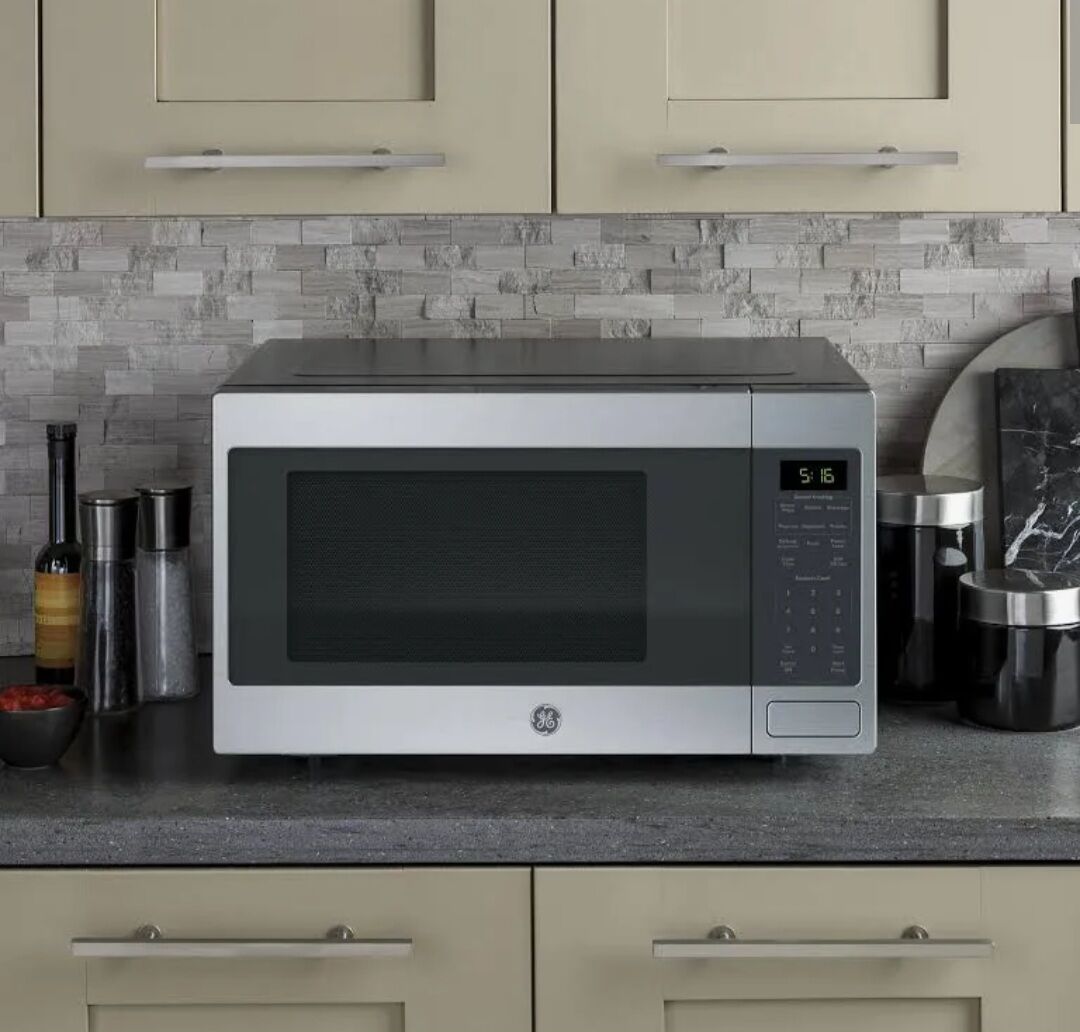 NEW GE 1.6 Cu Ft Countertop Microwave Oven Stainless Steel