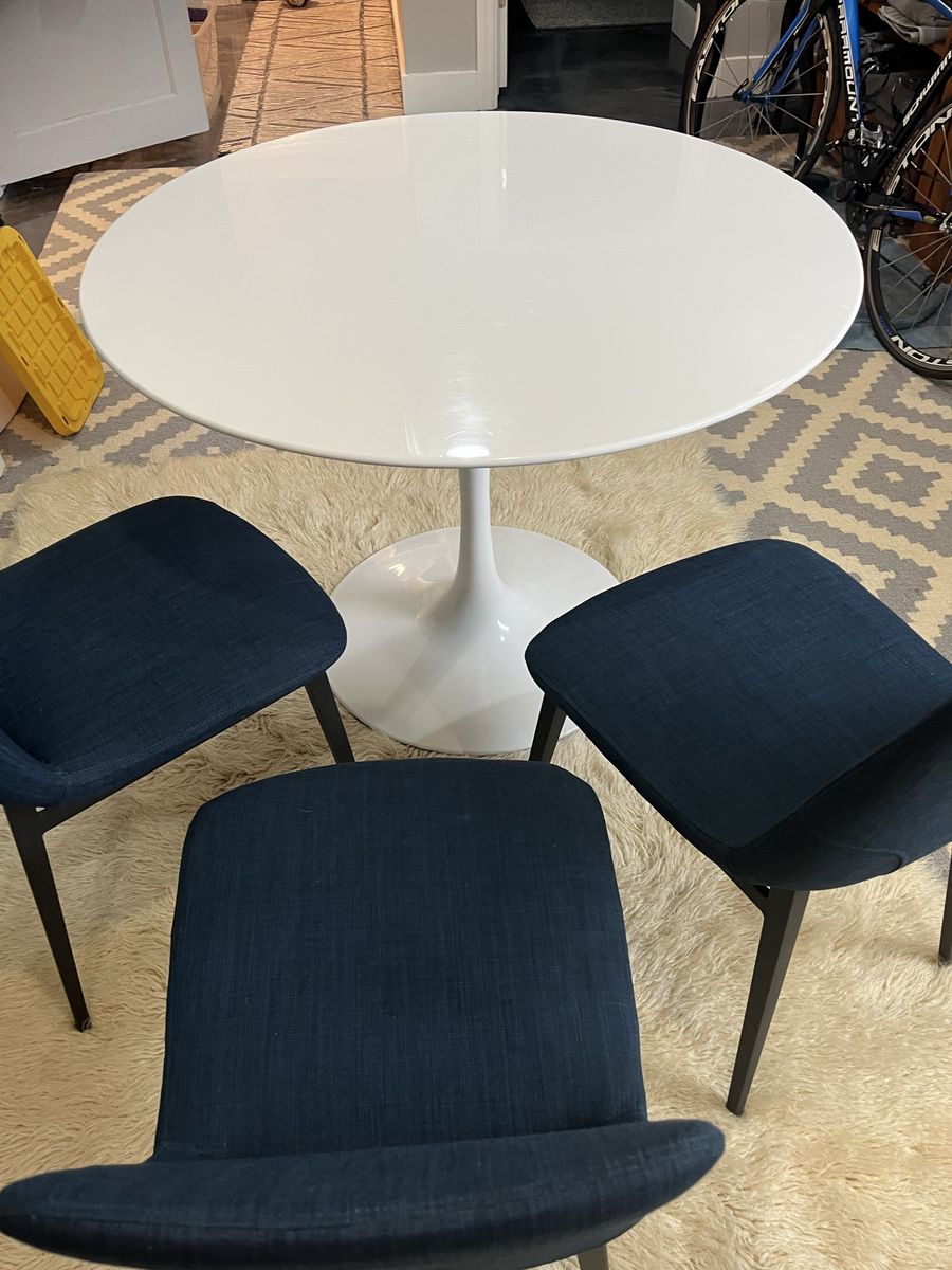 Modern White Round Tulip Dining Table with Blue Fabric Chairs Set, contemporary. 