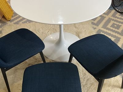 Modern White Round Tulip Dining Table with Blue Fabric Chairs Set, contemporary.