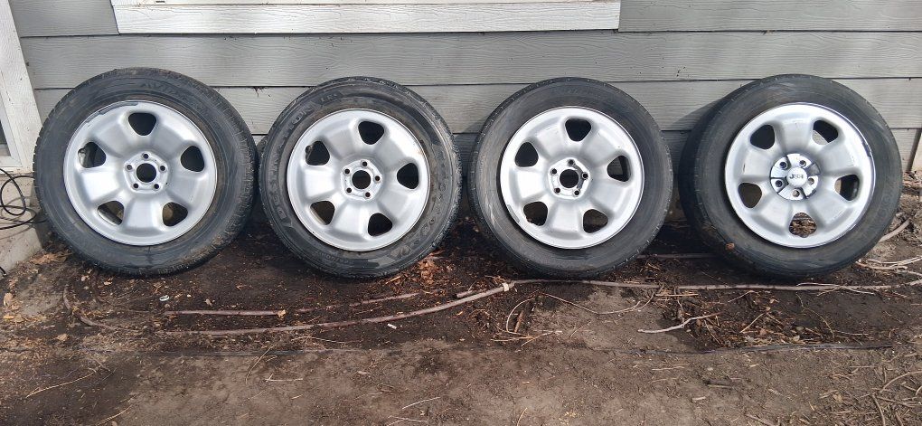 4 OEM Jeep 225/60R17 Tires on Steel Wheels
