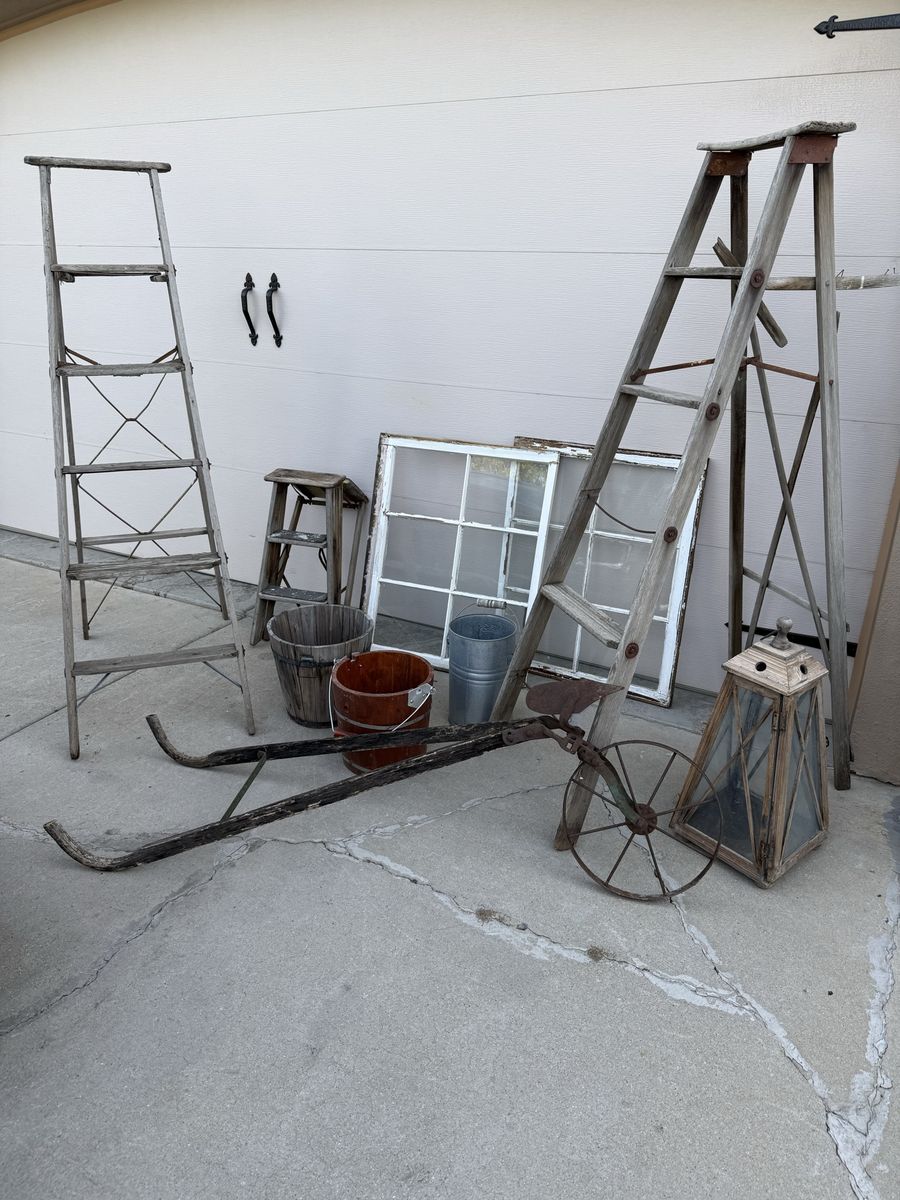 Antiques used for a wedding! Wood Ladders 6’ $60 each, plow $100, windows 34 X 28 $50 each