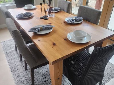 Dinning room table 60" X 36" Solid wood with 6 brown wicker durable and stylish chairs