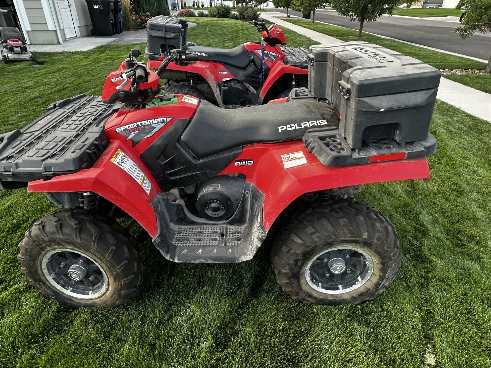 Two Polaris Sportsman 500 H.O. EFI AWD ATV with Rear Cargo Box