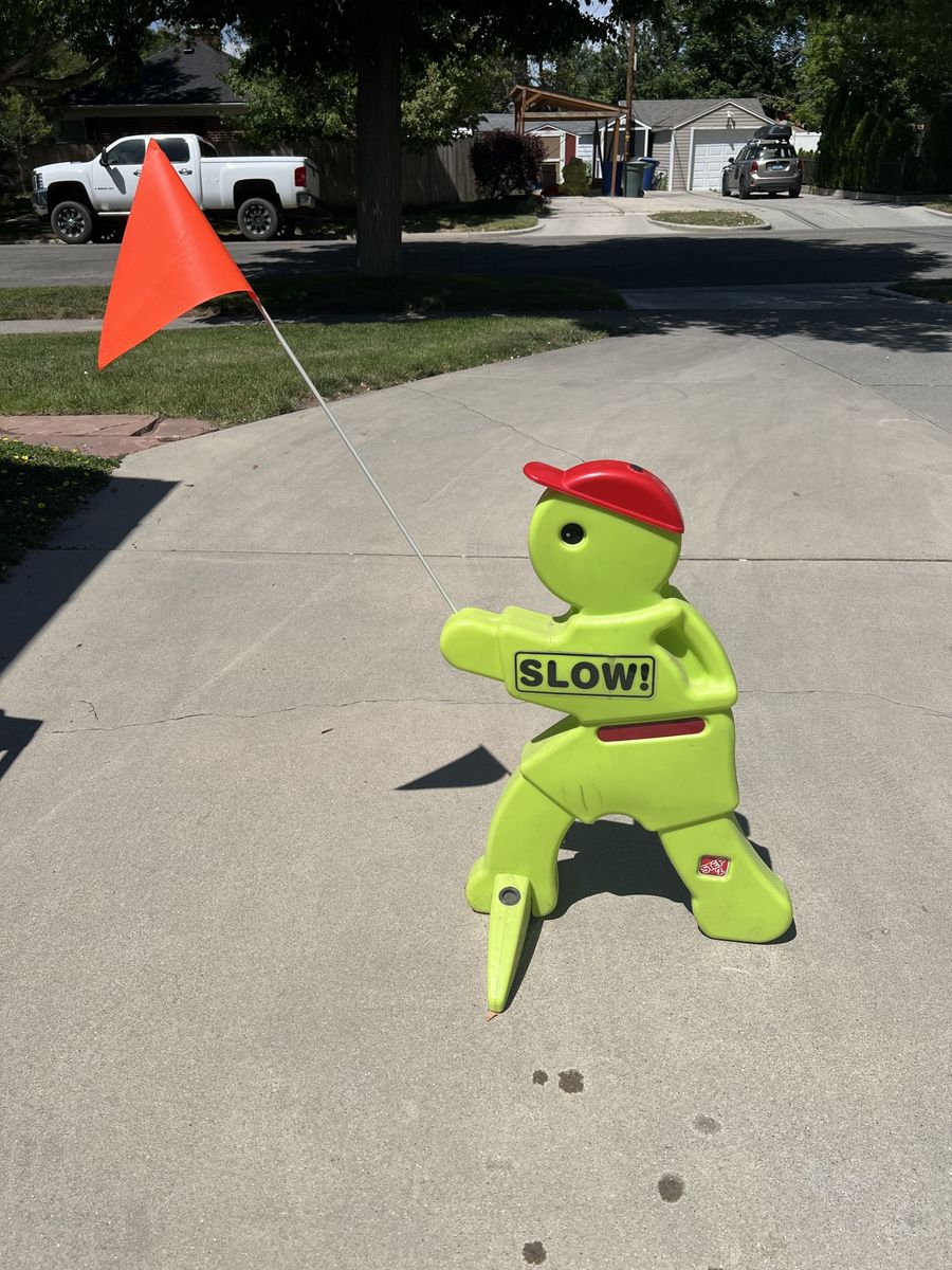 Step 2 ‘SLOW’ kid alert safety sign with flag