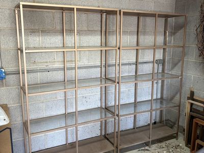 Glass and metal bookcases