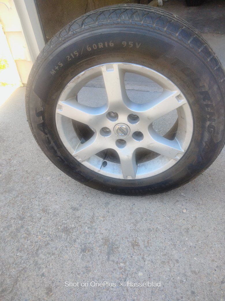 Nissan OEM 16 Inch Alloy Wheel with 215/60R16 M+S Tire