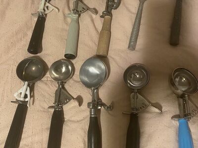 Many vintage ice cream scoop scoopers