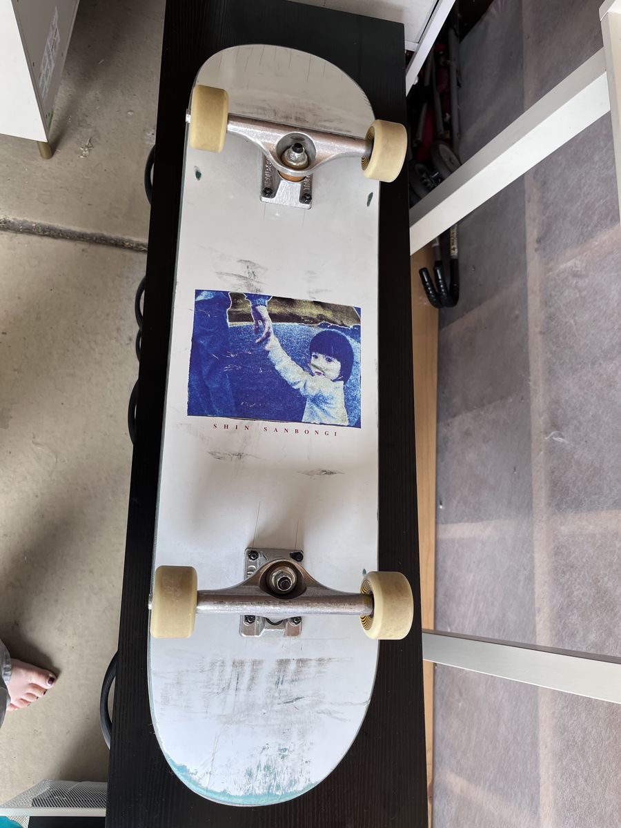 Skateboard with Shin Sanbongi image on the bottom