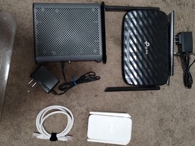 Complete modem and router setup with range extender.