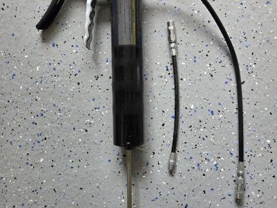 Pistol-Grip Grease Gun with Extra Hose. Grease tube.