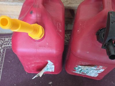 2 5-gallon gas cans