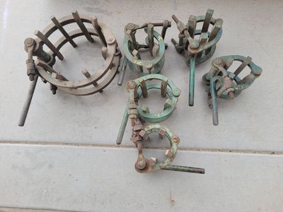 Welding pipe lineup clamps