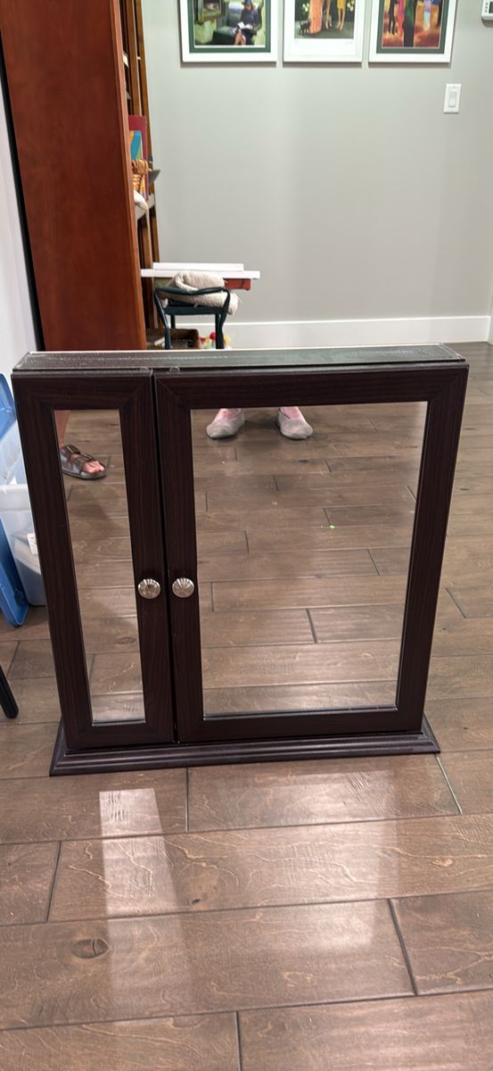 Mirrored medicine cabinet