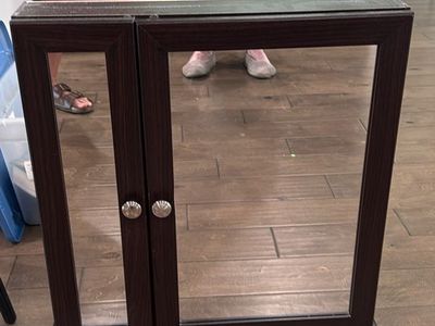 Mirrored medicine cabinet