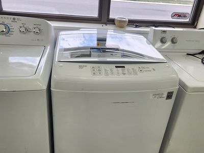 NICE LG TOPLOAD WASHER! WITH A FULL WARRANTY