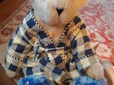 Vermont Teddy Bear with blue check bathrobe and slippers